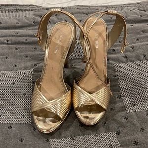 Gold heels with platform worn maybe twice for a state pageant